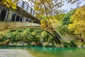 Voidomatis river in aristi village trees rafting boats in autumn season