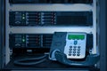 VOIP Phone IP Phone in data center room Royalty Free Stock Photo