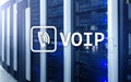 VOIP, Voice over Internet Protocol, technology that allows for speech communication via the Internet. Server room background