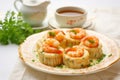 Vol au vent with shrimp and sauce. Puff pastry stuffed with cream cheese and prawns. Generative AI