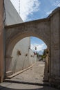 Volanic stone arch and alley in Arequipa, Peru