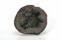 Volcanic bomb from the slopes of Vesuvius volcano, cut-in-half, filled with olivine and other minerals crystals. On