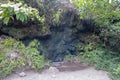 Volcanic chimney with escaping smoke and gases on the crater wall of the active Batur volcano.A volcano crater spewing white gas