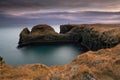 Volcanic cliffs and basalt rocks in Arnarstapi