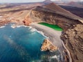 Volcanic crater with a green lake in El Golfo, Lanzarote. Aerial view