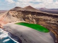 Volcanic crater with a green lake in El Golfo, Lanzarote. Aerial view Royalty Free Stock Photo