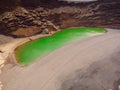 Volcanic crater with a green lake in El Golfo, Lanzarote. Aerial view Royalty Free Stock Photo