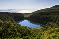 Volcanic crater with lake Lagoa Seca on Pico island short after sunrise Royalty Free Stock Photo