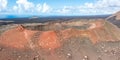 Volcanic crater volcanos in Timanfaya National Park on Lanzarote island aerial view panorama on Canary Islands in Spain