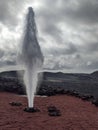 Volcanic geyser, powerful water eruption coming out the earth Royalty Free Stock Photo