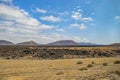 Volcanic hills in the desert landscape of the island of Lanzarote, which is a protected area of UNESCO