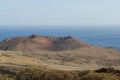 Volcanic landscape and Orchilla lighthouse, El Hierro island.