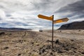 Volcanic landscape - roadsign and vehicle Royalty Free Stock Photo