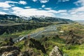 Volcanic landscape of Valahnukur trail and hiker man standing in Thorsmork at Highlands of Iceland