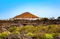 Volcanic landscape with a village, Island Lanzarote, Canary Islands, Spain, Europe