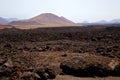 volcanic lanzarote spain timanfaya rock sky hill and summe Royalty Free Stock Photo