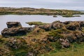 Volcanic rock formations in Lake Myvatn in Northern Iceland Royalty Free Stock Photo