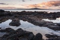 Volcanic rock pools at sunset Royalty Free Stock Photo