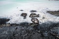 Volcanic rock and silicia infused water at the Blue Lagoon in Iceland - close up background image of the rocks