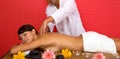 Volcanic stone massage at the spa Royalty Free Stock Photo