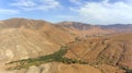 Volcanic terrain, green oasis valley, mountain roads, Canary Islands, Fuerteventura .