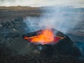 Volcano eruption in Iceland, crater, gas expulsion, and molten lava, aerial view