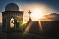 Volcano etna erupting from castelmola church and cross dramatic sunset Royalty Free Stock Photo