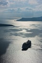 Volcano island with cruisers anchored around at Santorini Royalty Free Stock Photo