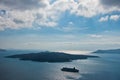 Volcano island with cruisers anchored around at Santorini Royalty Free Stock Photo