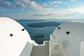 Volcano island with cruisers anchored around at Santorini Royalty Free Stock Photo