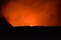Volcano at Night with Lava and smoke Royalty Free Stock Photo