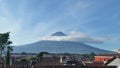 Volcano over city