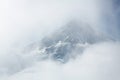 Volcano shrouded in fog