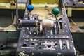 Volchansk, Ukraine - 18 June 2020: Control levers or throttle handles in the cockpit of old ruined aircraft Antonov An-2 at