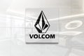 Volcom on glossy office wall realistic texture