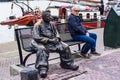 Statue in Volendam city harbour, The Netherlands