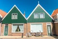 Volendam, Netherlands. Classic homes aligned along city street Royalty Free Stock Photo