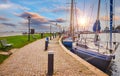Volendam, Netherlands. Luxury yacht parked by pier on sunset Royalty Free Stock Photo