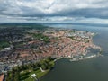 Volendam, Netherlands. Traditional dutch fishing village city traditional buildings and harbor. Touristic attraction sky