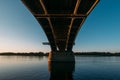 Volga bridge and embankment over Volga river at sunset, Yaroslavl region, Rybinsk city, Russia. Beautiful landscape Royalty Free Stock Photo