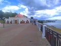 Volga river embankment with harbour anhd White Sun restaurant in Kostroma, Russia