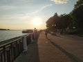 Volga river embankment on sunset with harbour and ship in Kostroma, Russia