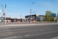 Volgograd city - urban landscape-view of the tram metrotram. sunny day, red and white tram. tram cars, pedestrian crossing.