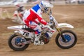 Volgograd, Russia - April 19, 2015: Motorcycle racer racing on dirt track, at the stage of the Open Championship Motorcycle Cross