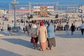 Three women watching the city holiday in honor of Easter in Volgograd