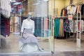 Volgograd, Russia, 07.30.2019: A dummy in the form of the sitting woman dressed in a long gray skirt and a white blouse