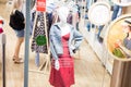 Volgograd, Russia, 07.30.2019: A female dummy in modern clothes - a red dress and a jeans jacket in a shop