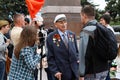 People interview a veteran of world war II on the Square of the Fallen Fighters in Volgograd Royalty Free Stock Photo