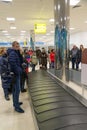 Volgograd, Russia - October 31.2016. Passengers await the luggage around baggage carousel in C terminalan of Aeroport Royalty Free Stock Photo