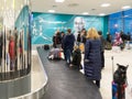 Volgograd, Russia - October 31.2016. Passengers await the luggage around baggage carousel in C terminalan of Aeroport Royalty Free Stock Photo